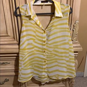 White and yellow stripes top.